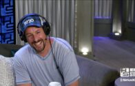 Adam Sandler and Howard Stern recite the blessing on the Torah.